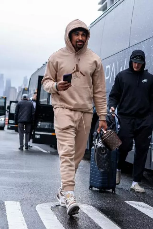 Jordan Beige Flight Logo Baseline Flight Hoodie worn by Jalen Hurts on the Instagram account @jalenhurts