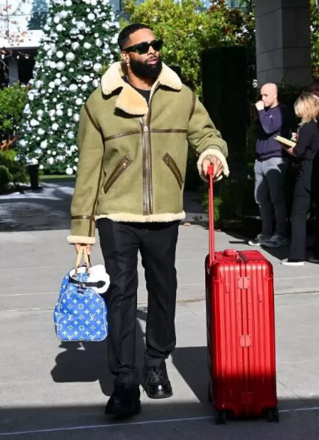Louis Vuitton Olive Green Shearling LV Lovers Aviator Jacket worn by Odell Beckham Jr. on the Instagram account @obj