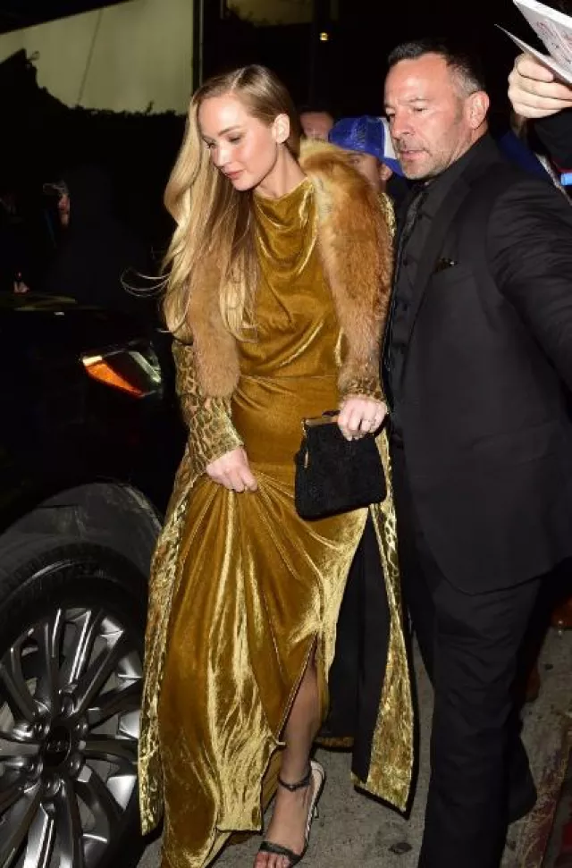 Manolo Blahnik Chaos Strap Sandals worn by Jennifer Lawrence at Golden Globes After Party on January 7, 2024