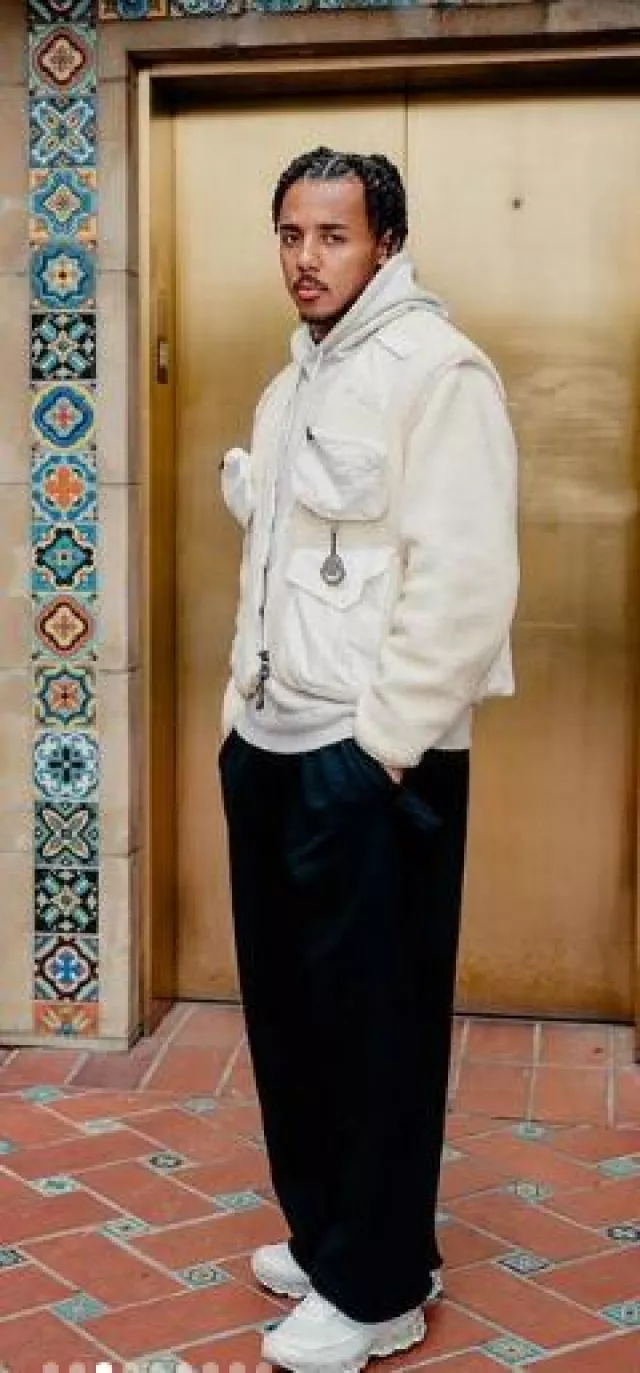 Moncler x Pharrell Cream Shearling Cargo Jacket worn by Jules Koundé on the Instagram account @jkeey4