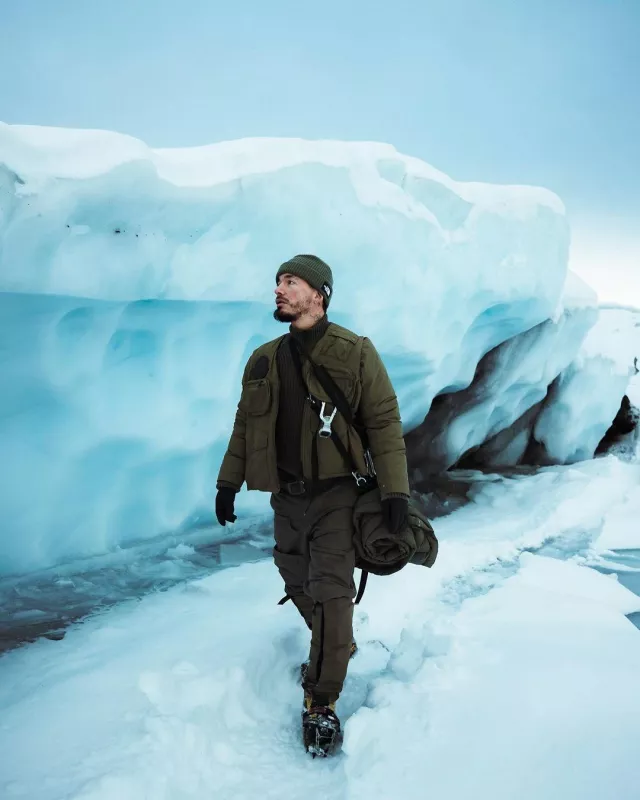 Moncler x Pharrell Olive Green Down Travel Blanket worn by J Balvin on the Instagram account @jbalvin