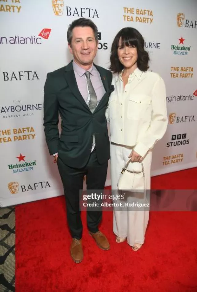 Tod’s T Case Tote Messenger Bag in Leather Micro worn by Neve Campbell at Bafta Tea Party on January 13, 2024