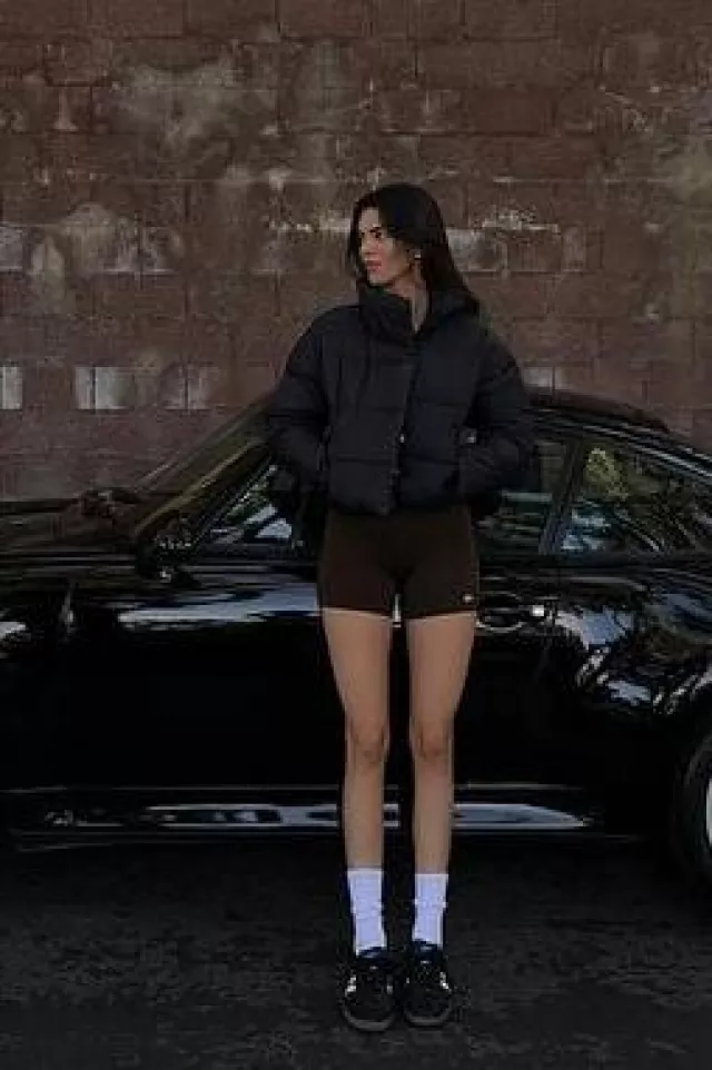 Alo Yoga Gold Rush Puffer in Black worn by Kendall Jenner on her Instagram post on January 17, 2024