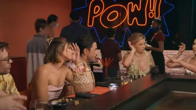 Loveshackfancy Rain­bow Pas­tel Straw Bag worn by Rachel Leviss as seen in Vanderpump Rules (S10E10)