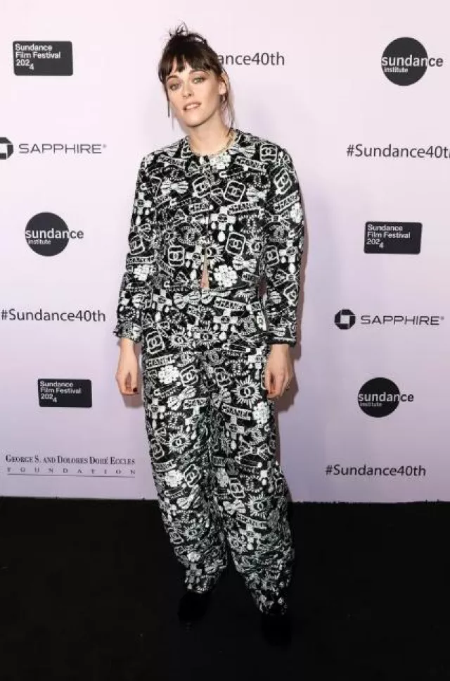 Chanel Shiny Calfskin Metal CC Loafers worn by Kristen Stewart at Sundance Film Festival 2024 on January 18, 2024