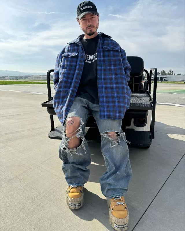 Balenciaga Dirty Backwards Destroyed Baggy Jeans worn by J Balvin on the Instagram account @jbalvin