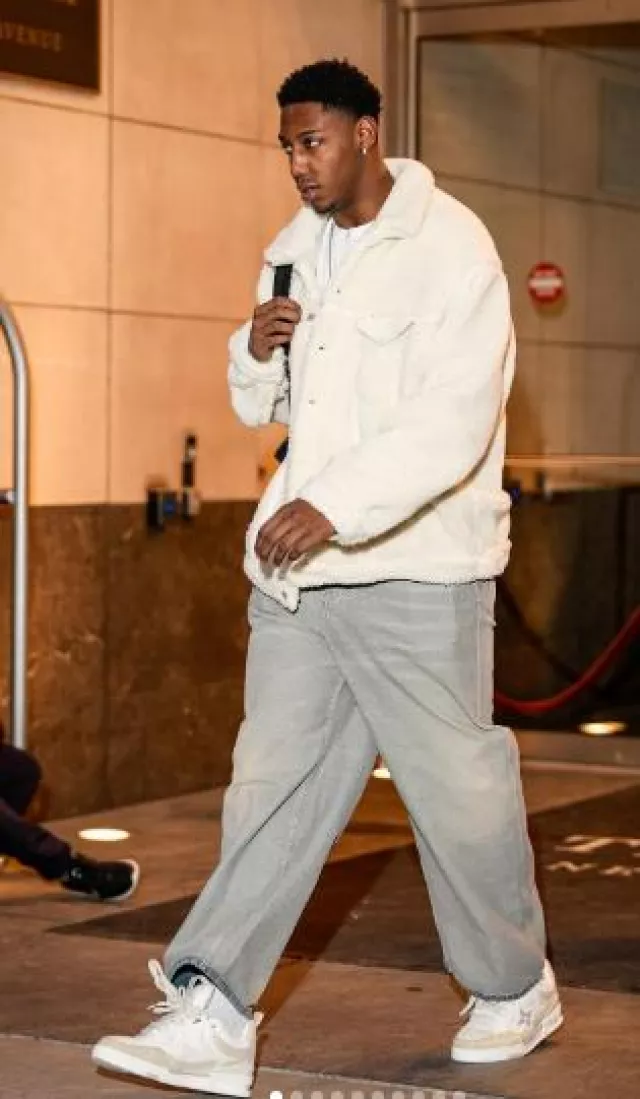 Balenciaga Light Blue Inside-Out Baggy Jeans worn by R. J. Barrett on the Instagram account @rjbarrett