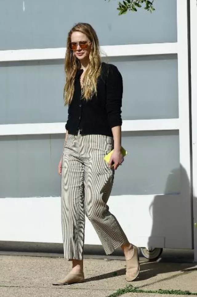 The Row Sock Leather Trimmed Mesh Flats worn by Jennifer Lawrence in Los Angeles on January 27, 2024