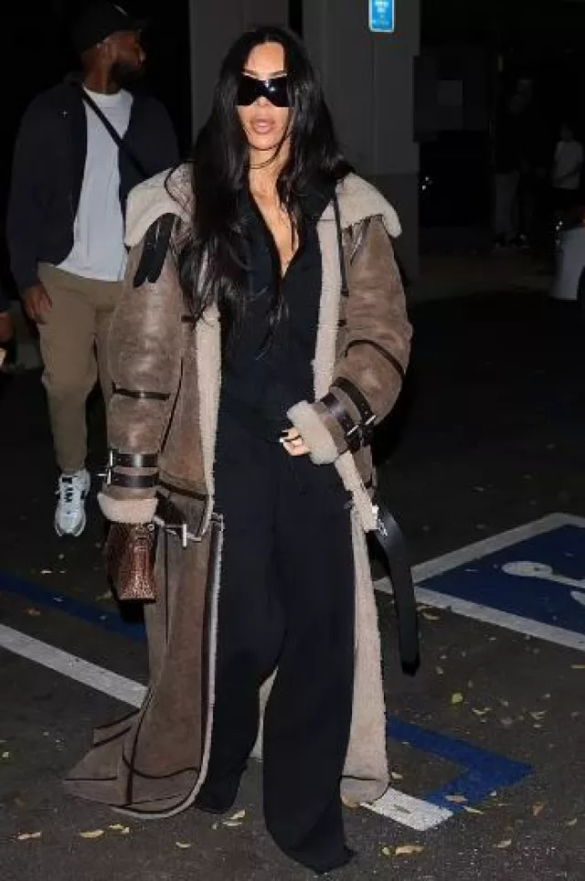 Hermès Kelly Pouchette Croc Bag worn by Kim Kardashian in Los Angeles on January 26, 2024