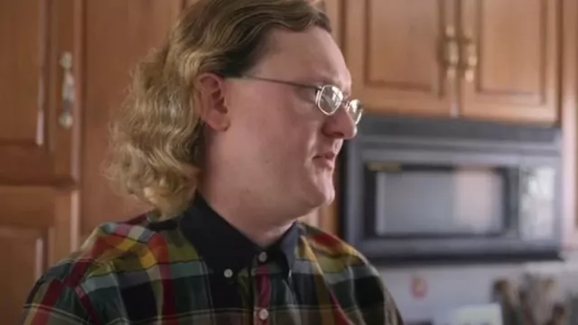 Tommy Hilfiger Yel­low and Red Shirt worn by James Jones as seen in Love on the Spectrum (S02E04)