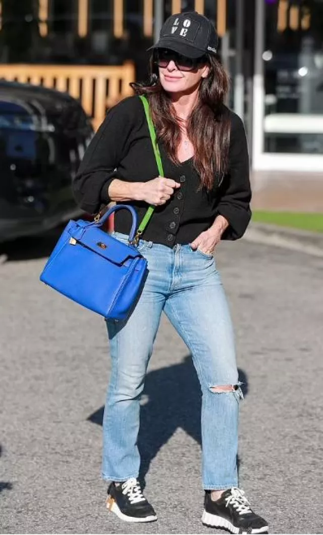 Hermes Bouncing Sneakers worn by Kyle Richards in  Bel Air on January 28, 2024