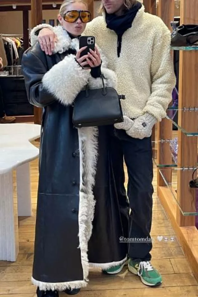 Magda Butrym Double Breasted Shearling Coat in Black worn by Elsa Hosk on her Instagram Story on February 2, 2024