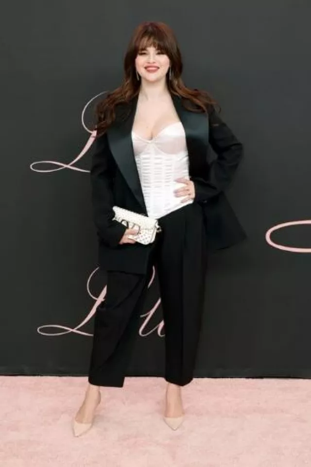 Manolo Blahnik Carolyne Suede Slingback Pumps in Cream worn by Selena Gomez at Lola Premiere on February 3, 2024