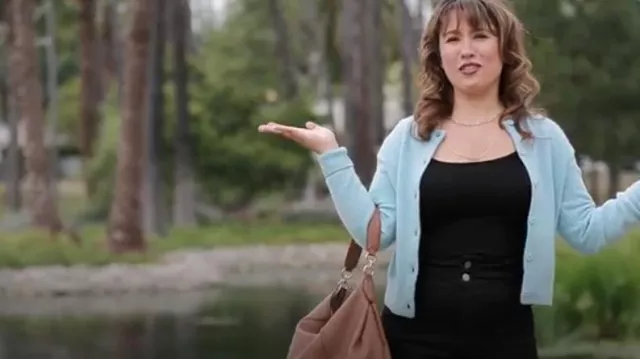 Michael Kors Shoul­der Bag worn by Dani Bowman as seen in Love on the Spectrum (S02E07)