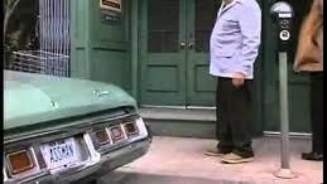 Assman Vanity Plate of Cosmo Kramer (Michael Richards) in Seinfeld (S06E21)