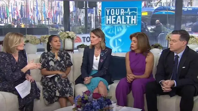 Black halo Cor­rine High-Neck Sleeve­less Jump­suit worn by Hoda Kotb as seen in Today on February 21, 2024