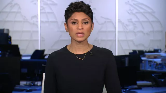 Elie Tahari Win­da Draped Long Sleeve Dress worn by Jericka Duncan as seen in CBS Evening News on February 26, 2024