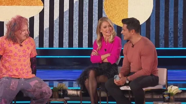 Prada Feather Trimmed Wool Midi Skirt worn by Kelly Ripa as seen in LIVE with Kelly and Mark on February 28, 2024