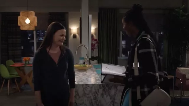 Ted Baker Loop And Tab Granny Crossbody Bag In Taupe worn by Abishola (Folake Olowofoyeku) as seen in Bob Hearts Abishola (S05E04)