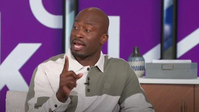 Ted Baker Wickam Cotton Textured Waffle Knit Color Blocked Long Sleeve Polo Shirt worn by Akbar Gbaja-Biamila as seen in The Talk on March 1, 2024