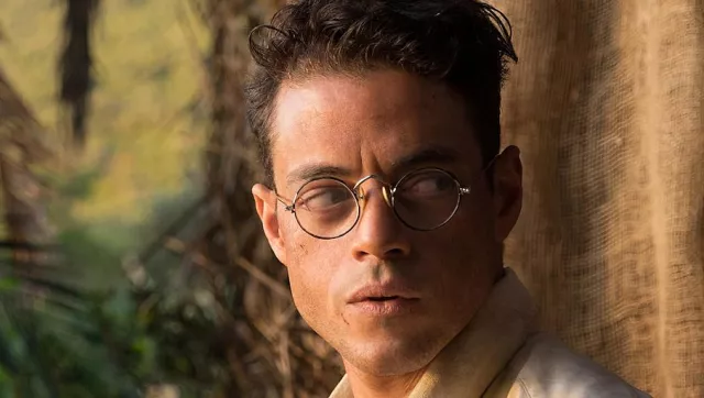 Lunettes rondes portées par Louis Dega (Rami Malek) dans Papillon