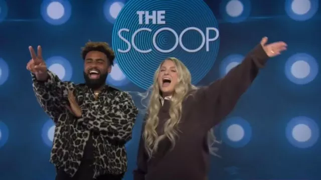 Fear of God Essentials Henley Rugby Sweatshirt worn by Meghan Trainor as seen in Today with Hoda & Jenna on March 14, 2024