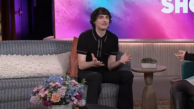 Todd Snyder Italian Cotton Riviera Sweater worn by Finn Wolfhard as seen in The Kelly Clarkson Show on March 19, 2024