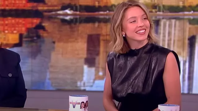 Khaite Uni Ribbed Waist Leather Dress worn by Sydney Sweeney as seen in The View on March 20, 2024
