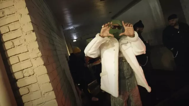 ERL Shiny White Shear­ling Jack­et worn by Future in Type Shit with Metro Boomin, Travis Scott, Playboi Carti (Official Video)