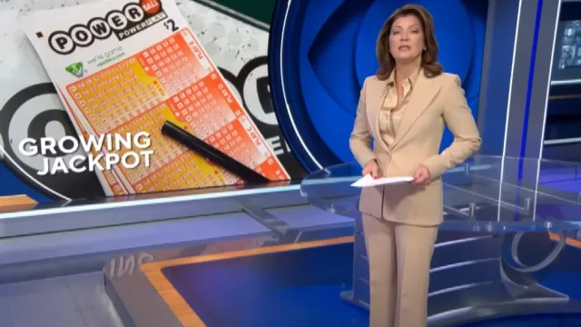 Michael Kors Charlie Crepe Pants worn by Norah O'Donnell as seen in CBS Evening News on April 5, 2024