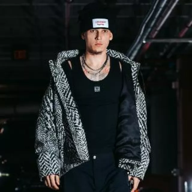 Charles Jeffrey Loverboy Black Ribbed Ears Beanie worn by Tyler Herro on his Instagram account @nolimitherro