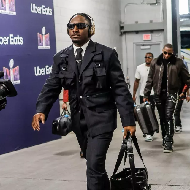 Prada Dark Grey Triangle-Logo Tie worn by Deebo Samuel on the Instagram account @1deebosr