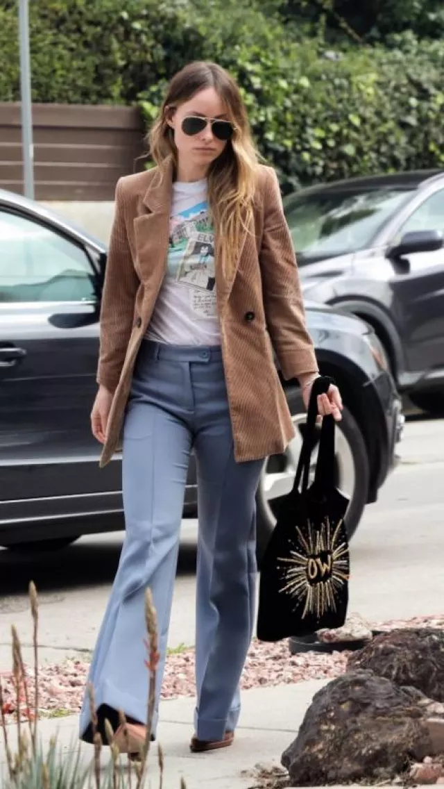 The Vampire’s Wife Custom Initial Book Bag worn by Olivia Wilde Little Dom’s in Los Feliz on February 17, 2024