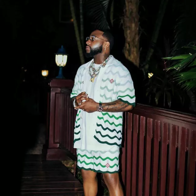 Casablanca White & Wavy Green Stripe Crochet Shorts worn by Davido on the Instagram account @davido