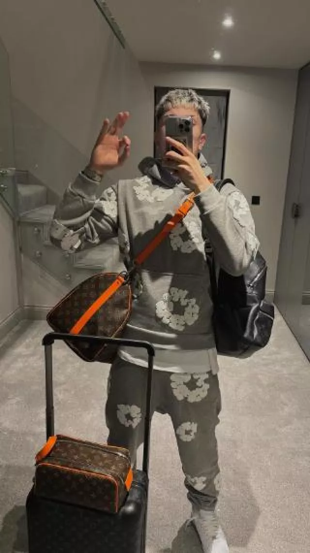 Louis Vuitton Brown Monogram & Green Trim Toiletry Bag worn by Alejandro Garnacho on the Instagram account @garnacho7