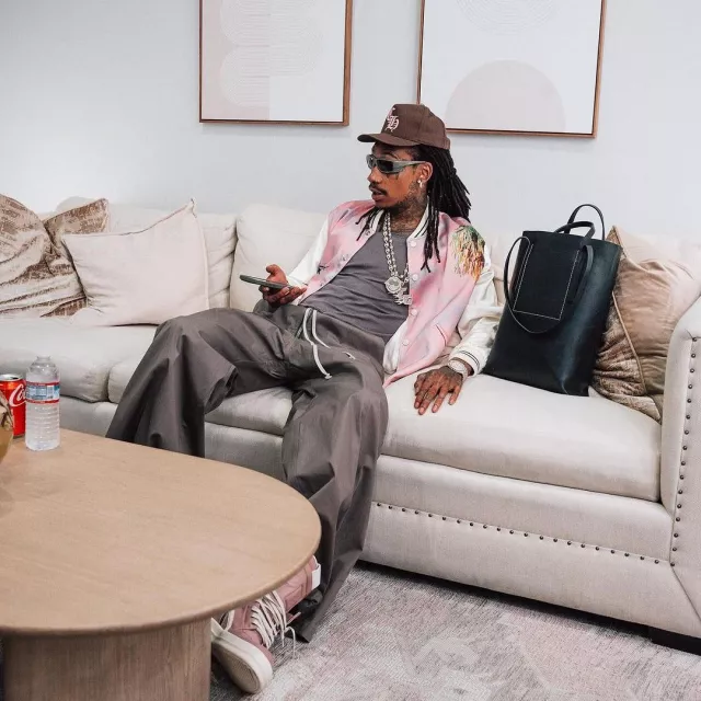 Rick Owens Pantalon large 'Bela' gris poussière porté par Wiz Khalifa sur le compte Instagram @wizkhalifa