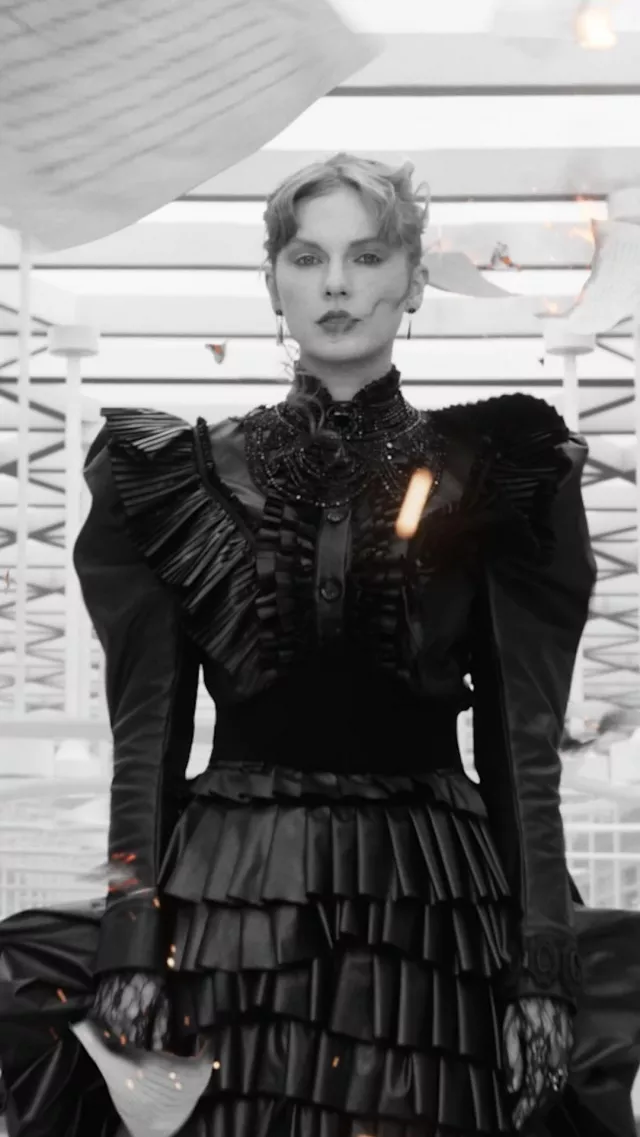 Atelier Unttld Victor Ruffled Waxed Denim Jacket worn by Taylor Swift in Fortnight Music Video on April 19, 2024