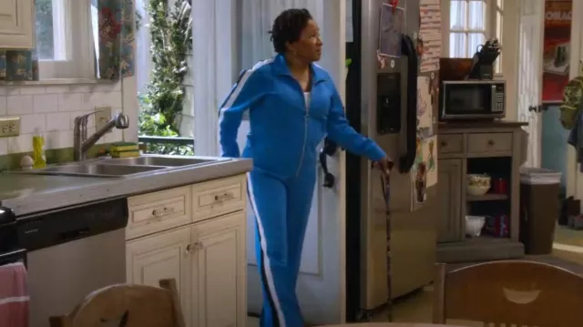 Pam & Gela The Classic Gela Flare Leg Track Pant worn by Lucretia Turner (Wanda Sykes) as seen in The Upshaws (S05E01)