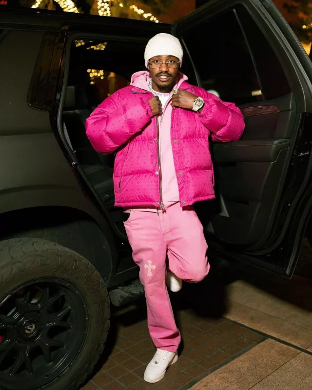 Chrome Hearts Hot Pink Cross Monogram Puffer Jacket worn by Lil Tjay on the Instagram account @liltjay