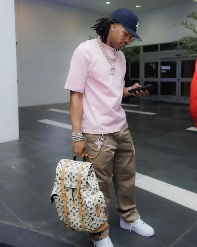 Chrome Hearts Pink & Checkered Cross Patch Khaki Pants worn by Lil Baby on the Instagram account @cbfw2040