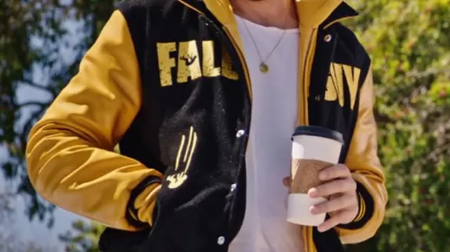 Get the look from The Fall Guy Promotion: Hooded Varsity Jacket worn by Ryan Gosling in The Fall Guy Carpool Marketing Video