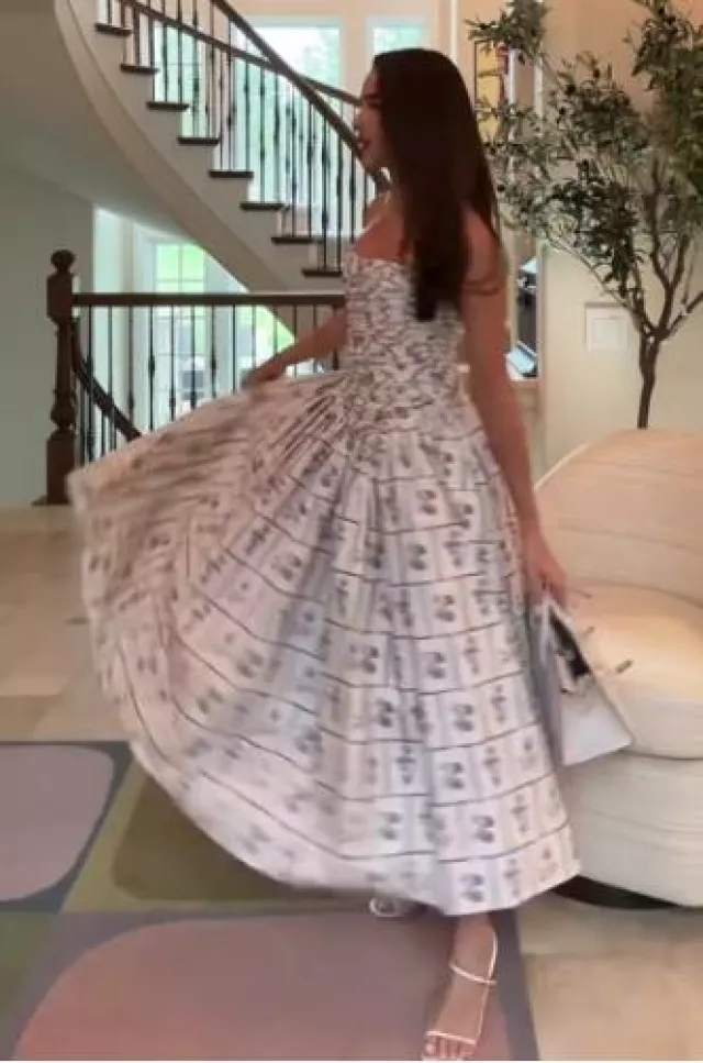 Khaite Cleo Strapless Ruched Floral Tile-Print Midi Dress worn by Olivia Culpo on her Tiktok Post on April 28, 2024