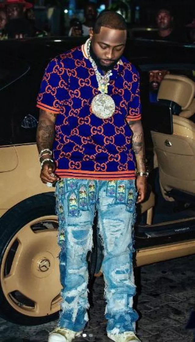 Who Decides War Blue Mini Stained Glass Patch 'Fusion' Jeans worn by Davido on the Instagram account @davido