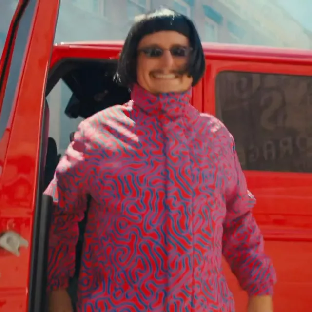 Oliver Tree Outfits: Iconic Printed Down jacket in red pink and purple