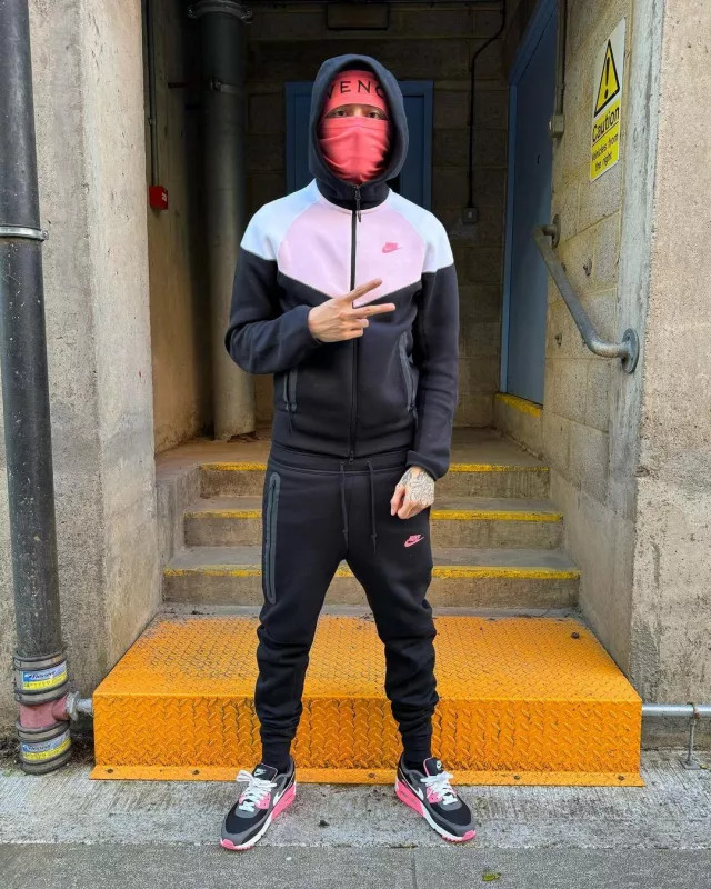 Nike Black & Pink Logo Fleece Joggers worn by Central Cee on the Instagram account @centralcee