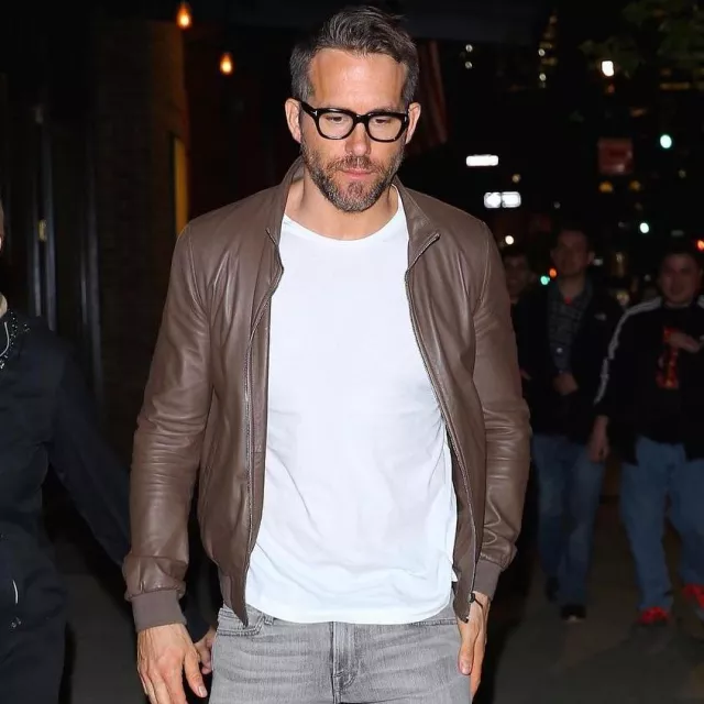 Ryan Reynolds Outfits: the actor is wearing a brown leather jacket after enjoying a night out with his mom Tammy in New York City on April 20, 2017
