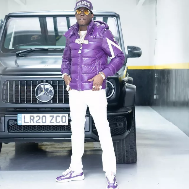 Pandemonium Purple 'PANDE' Trucker Hat worn by Bobby Shmurda on the Instagram account @itsbobbyshmurda