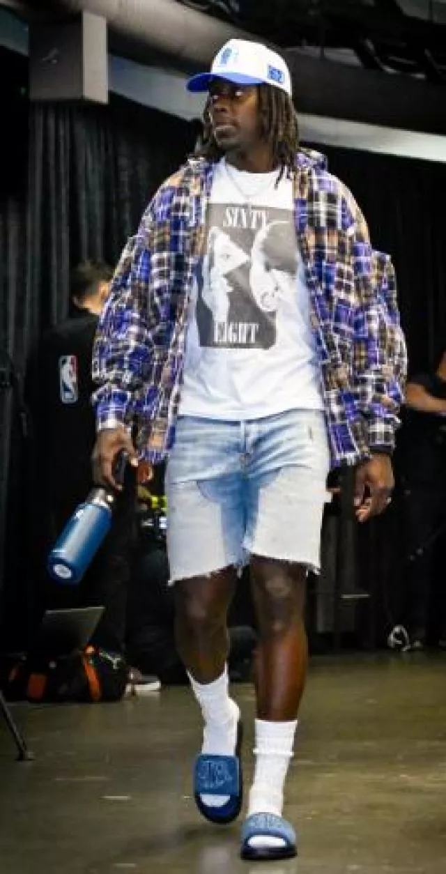 Who Decides War Purple & Brown Plaid Patchwork Shirt worn by Jrue Holiday on the Instagram account @celtics