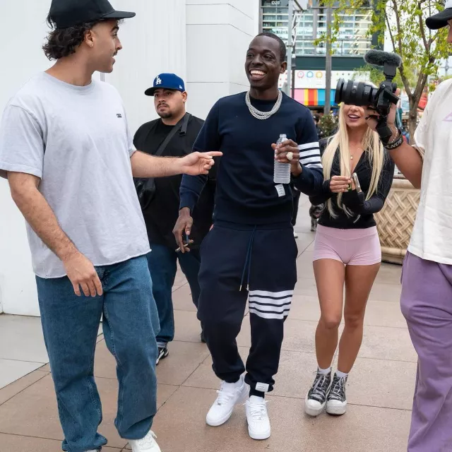 Thom Browne Navy Blue 4-Bar Sweatshirt worn by Bobby Shmurda on the Instagram account @itsbobbyshmurda