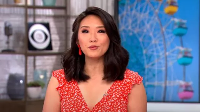 Loft Floral Ruffle Sleeve Wrap Midi Dress worn by Nancy Chen as seen in CBS Mornings on May 24, 2024